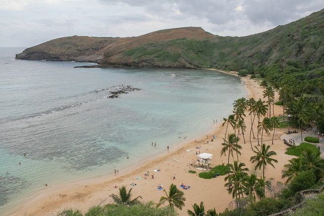 Hanauma Bay's turquoise reef and curving beach inside an old volcanic crater