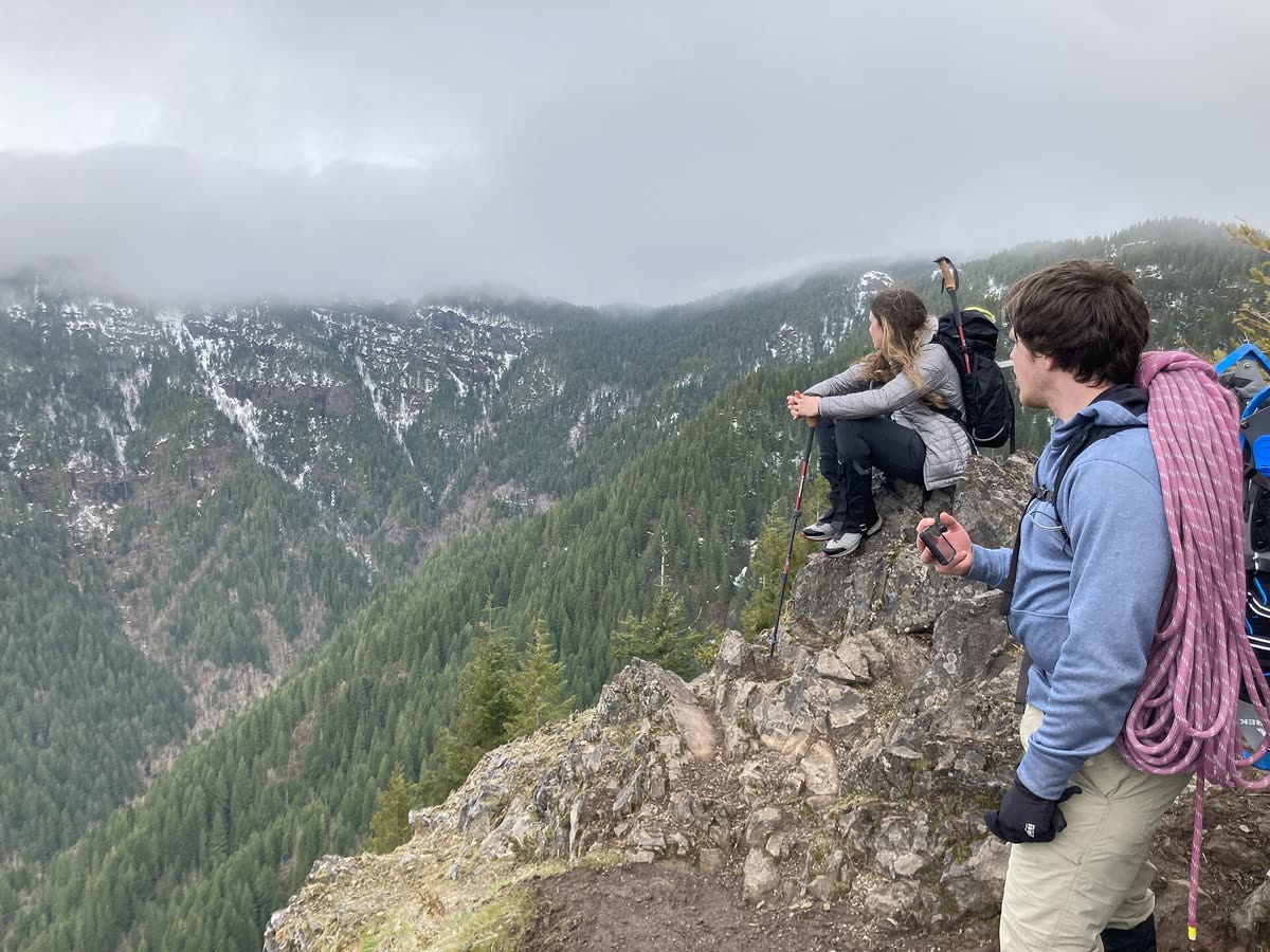 Hikers looking out over the mountains of Tillamook State Forest, Oregon
